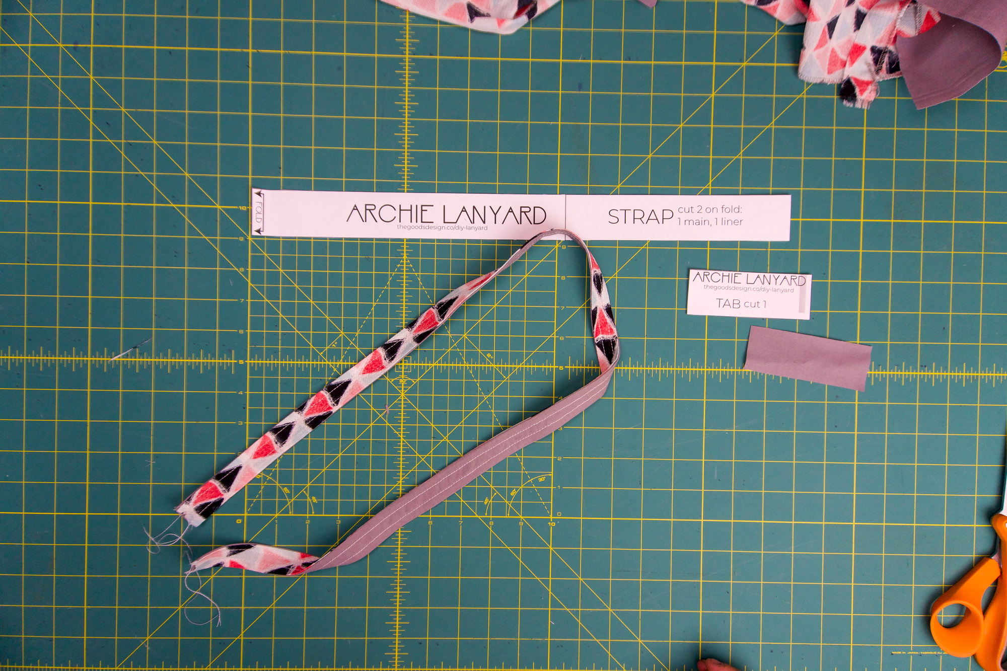 Topstitched strap.