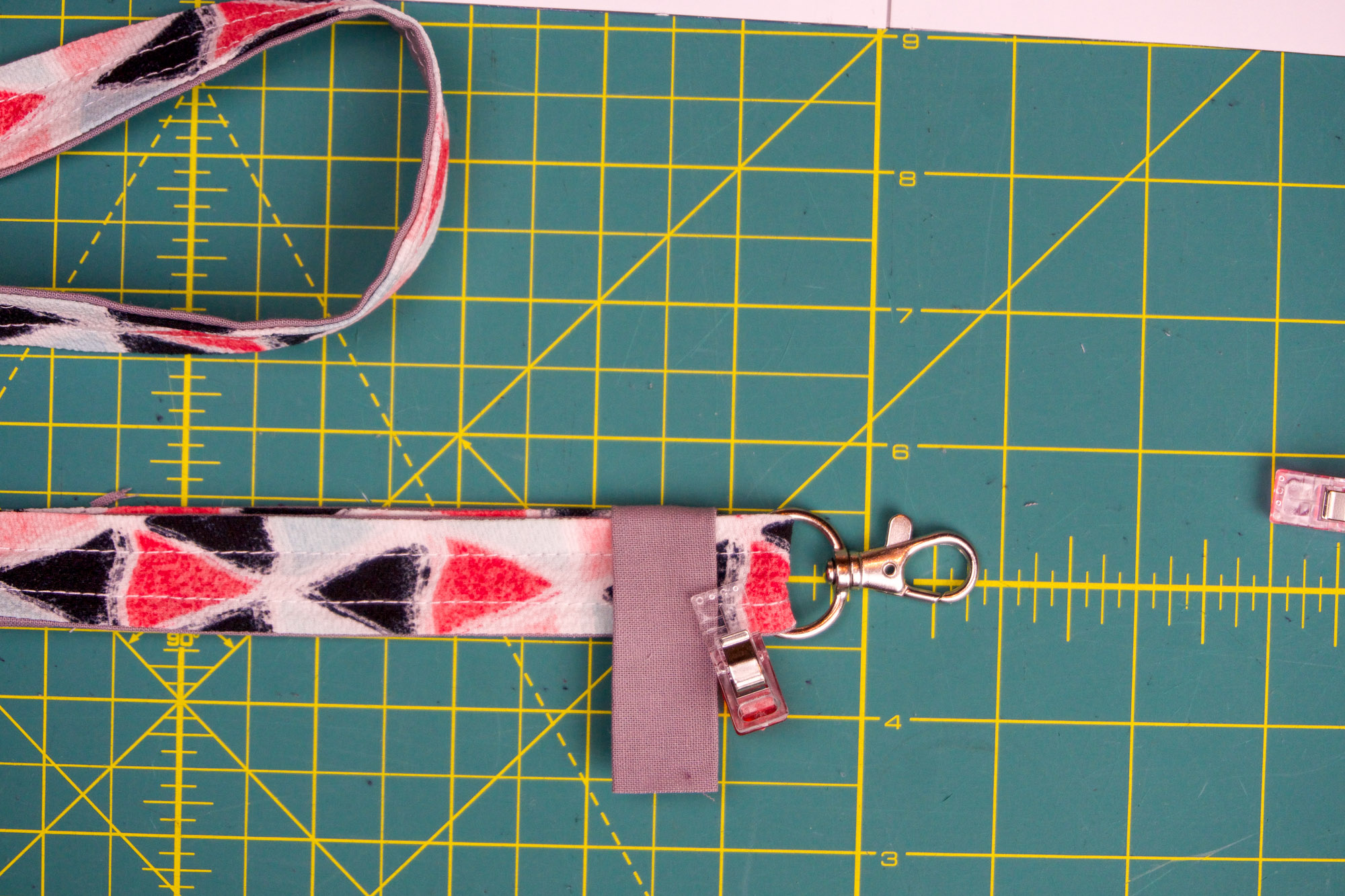 Wrapping the strap with the tab.