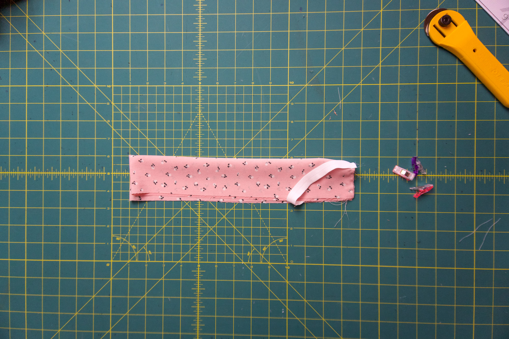 Sewn raw edges of the scrunchie folded.