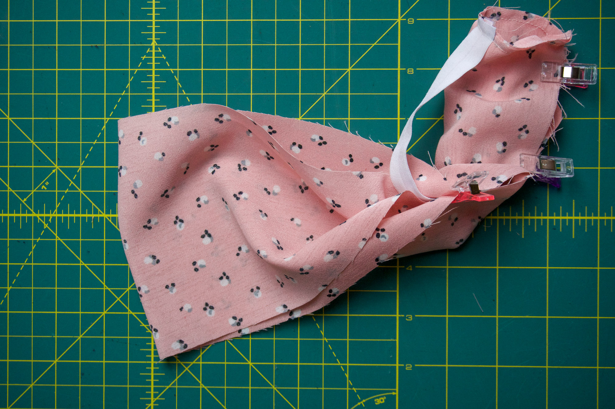 Clipping the outside edges together.